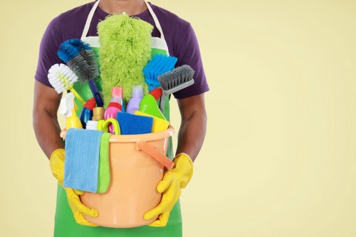 Professional oven cleaner in Roehampton deep cleaning a kitchen oven