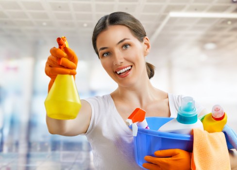 Trained carpet cleaner wearing PPE during a Roehampton cleaning job
